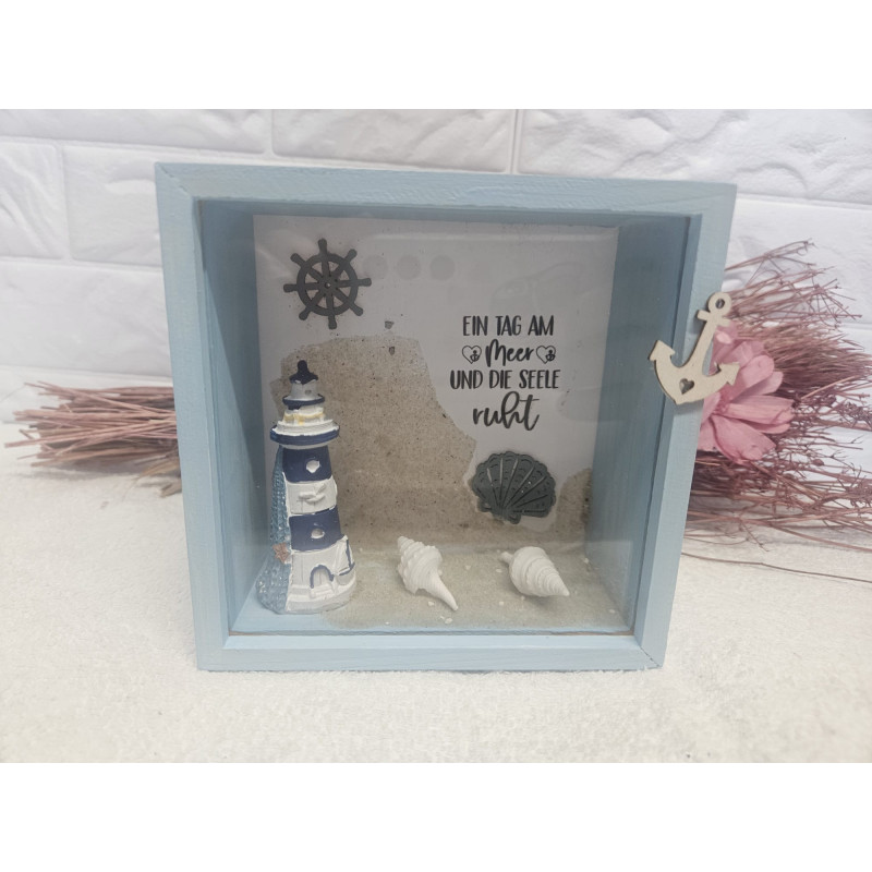 Holzrahmen mit Leuchturm