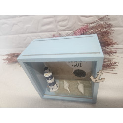 Holzrahmen mit Leuchturm